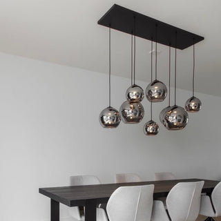 legante hanglamp met smoke glazen bollen voor boven de eettafel